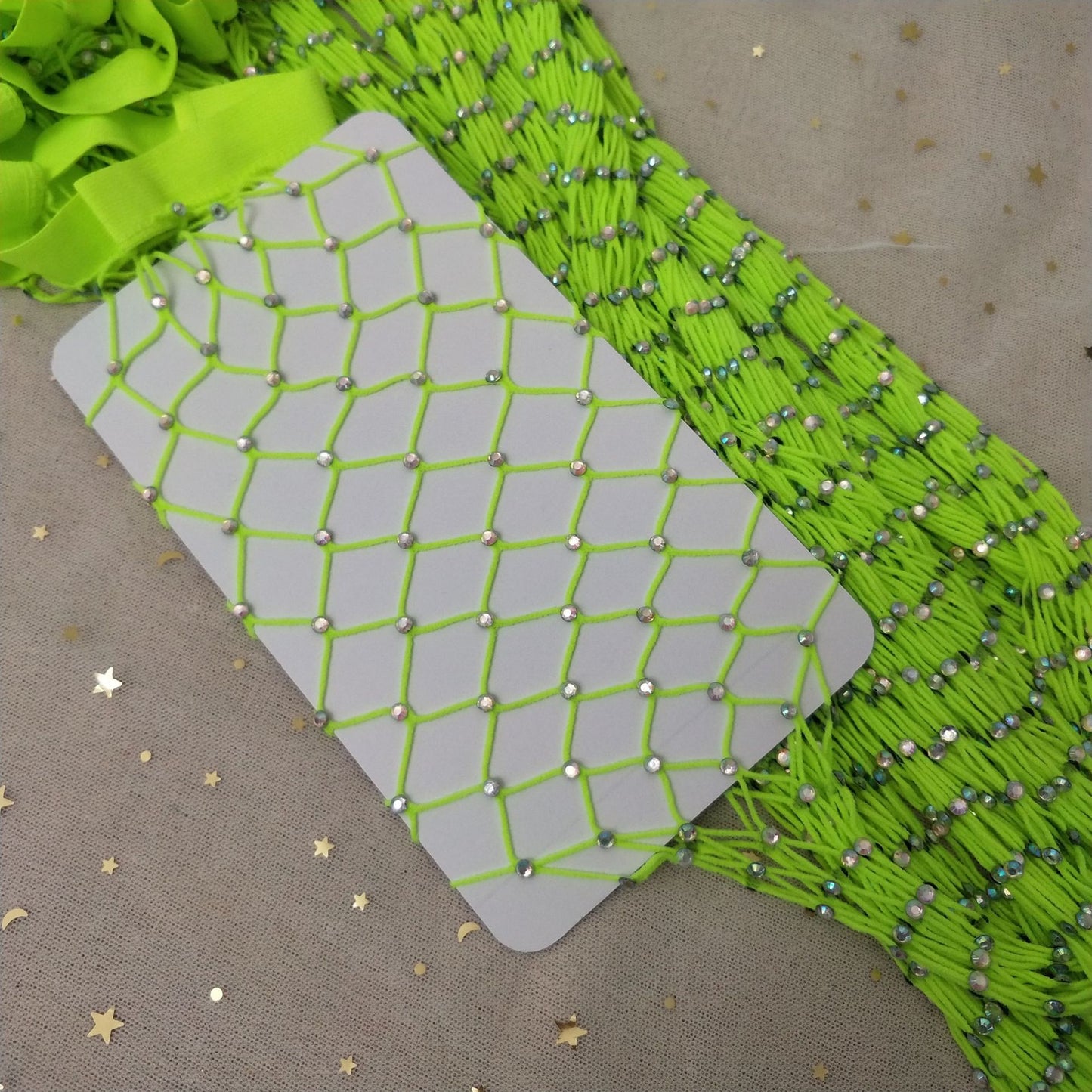Rhinestone-embellished large-mesh fishnet stockings